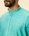 alt message - Manyavar Men Tropical Blue Diamond Patterned Kurta Set image number 1