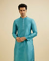 alt message - Manyavar Men Turquoise Blue Moroccan Patterned Kurta Set image number 0