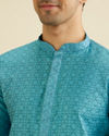 alt message - Manyavar Men Turquoise Blue Moroccan Patterned Kurta Set image number 1