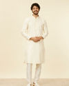 Manyavar Men Soft Cream Kurta Set with Buta Motifs