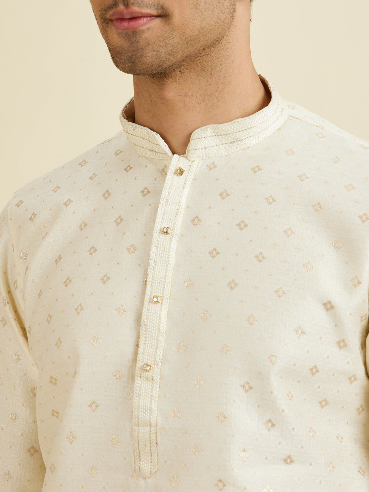 Manyavar Men Soft Cream Kurta Set with Buta Motifs