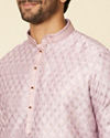 alt message - Manyavar Men Dusty Pink Grid Patterned Kurta Set image number 1