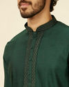 Manyavar Men Dark Green Bel Buti Patterned Kurta Set image number 1