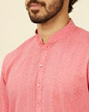 Manyavar Men Coral Pink Self Patterned Kurta Set