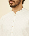 Manyavar Men Ivory Cream Self Patterned Kurta Set