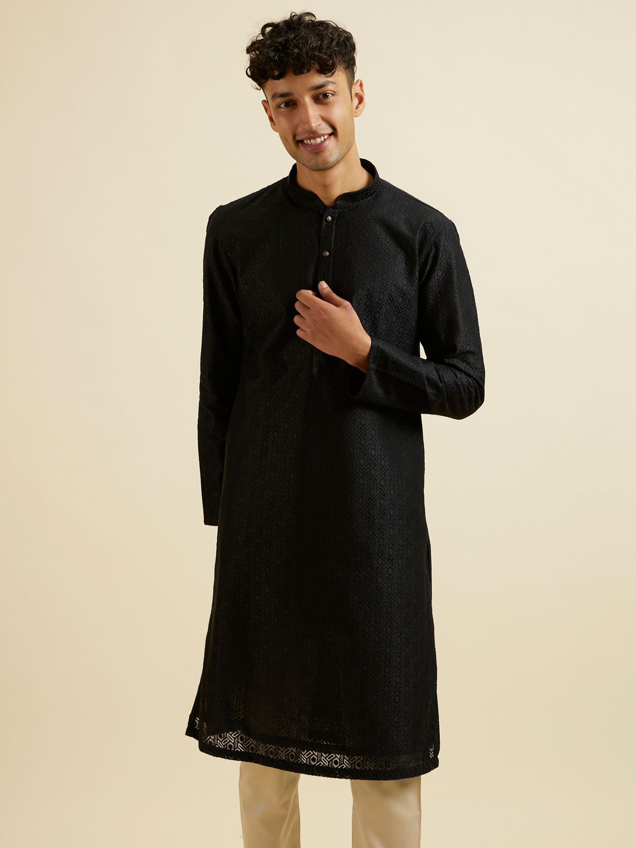 alt message - Manyavar Men Black Self Patterned Kurta Set image number 0