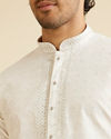 alt message - Manyavar Men Snow White Jaal Patterned Kurta Set image number 1