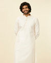 alt message - Manyavar Men Warm White Lattice Patterned Kurta Set image number 0