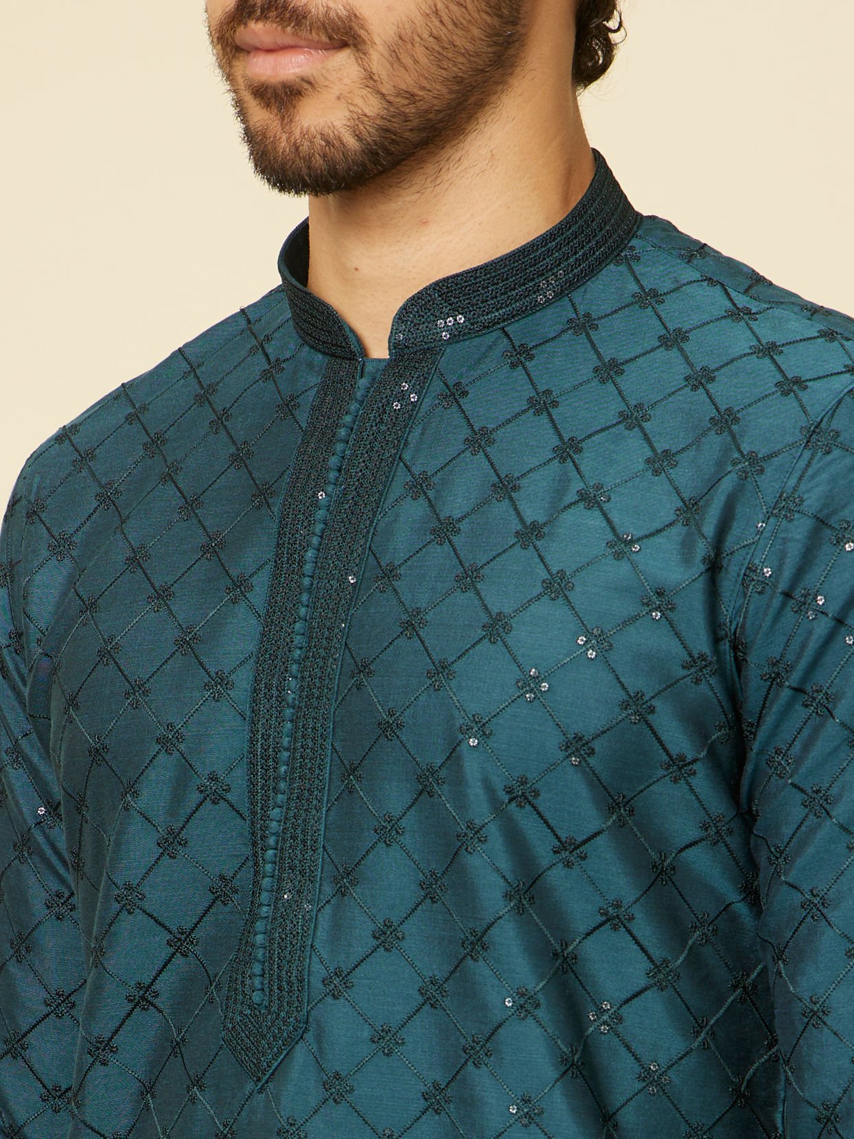 alt message - Manyavar Men Teal Blue Self Patterned Sequined Bandhgala Kurta Set image number 1