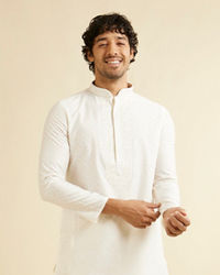 Manyavar Men Warm White Self Textured Kurta Set with Embroidered Neckline