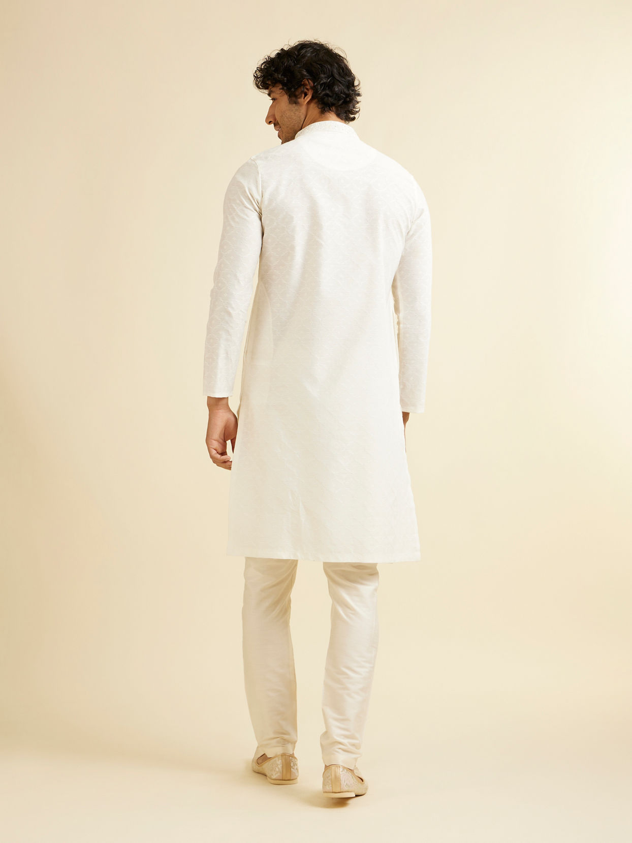 Manyavar Men Warm White Self Textured Kurta Set with Embroidered Neckline