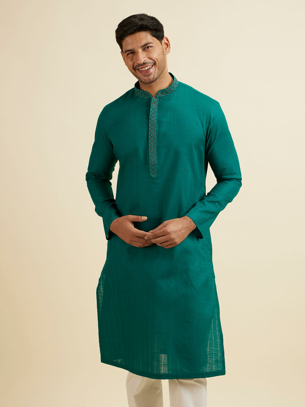 alt message - Manyavar Men Teal Green Striped Plain Kurta Set image number 0