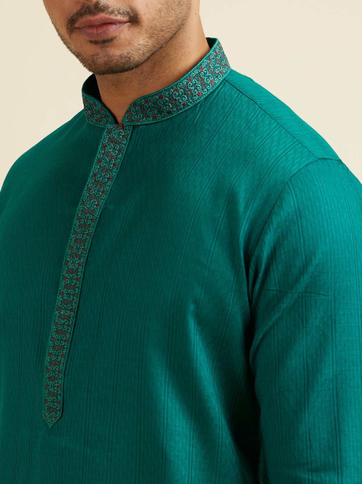 alt message - Manyavar Men Teal Green Striped Plain Kurta Set image number 1