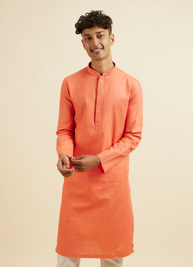 alt message - Manyavar Men Orange Plain Kurta Set image number 0