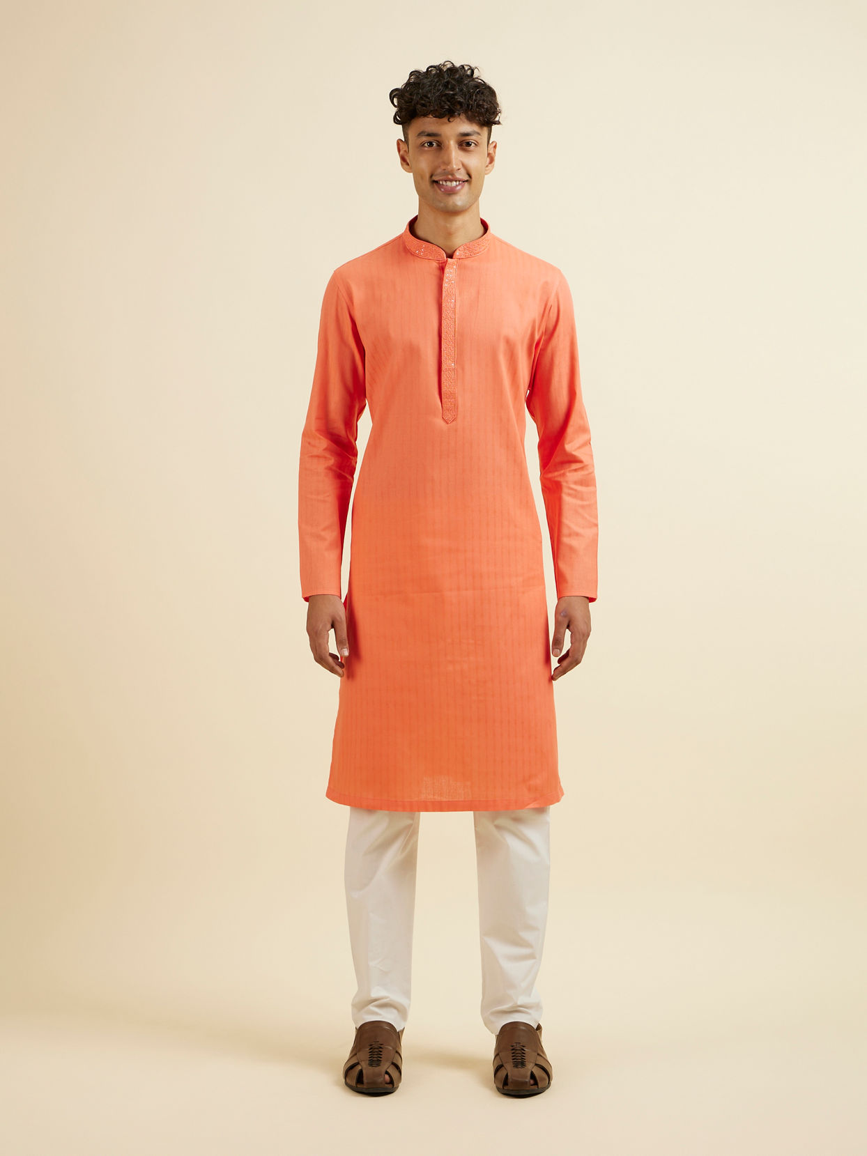 alt message - Manyavar Men Orange Plain Kurta Set image number 2