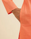 alt message - Manyavar Men Orange Plain Kurta Set image number 3