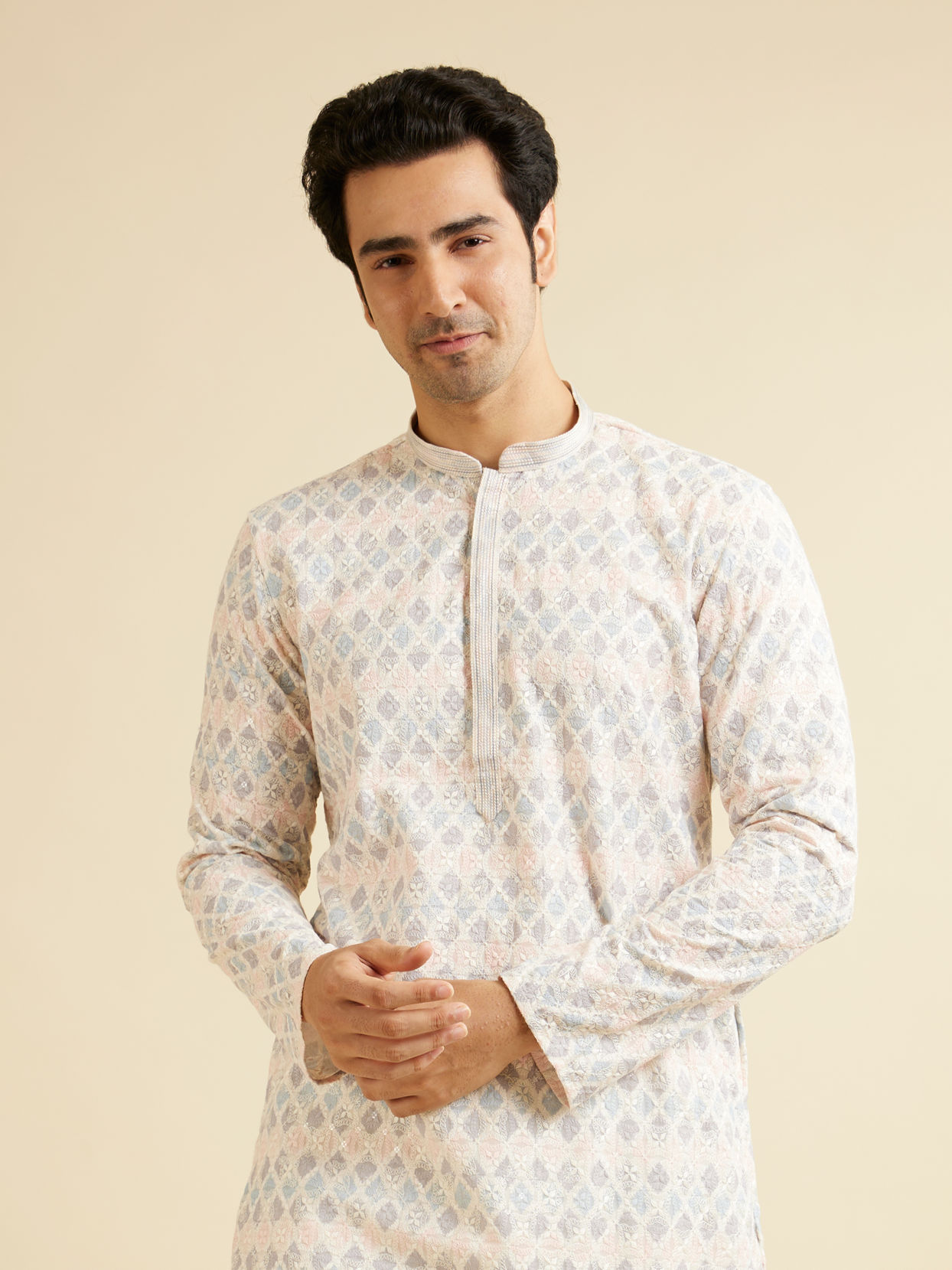 alt message - Manyavar Men Warm White Chikankari Inspired Sequinned Kurta Set image number 0