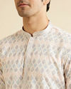 alt message - Manyavar Men Warm White Chikankari Inspired Sequinned Kurta Set image number 1