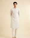 alt message - Manyavar Men Warm White Chikankari Inspired Sequinned Kurta Set image number 2