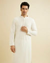 Manyavar Men Warm White Chikankari Embroidered Kurta Set with Sequin Work