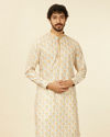 alt message - Manyavar Men Soft Beige Paisley Patterned Kurta Set image number 0