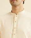 alt message - Manyavar Men Cream Beige Buta Jaal Patterned Kurta Set image number 1