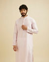 Manyavar Men Baby Pink Lattice Patterned Kurta Set with Sequinned Neckline image number 0