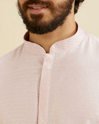 Manyavar Men Baby Pink Lattice Patterned Kurta Set with Sequinned Neckline