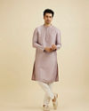 Manyavar Men Soft Lilac Self Patterned Kurta Set with Embroidered Neckline