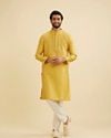 Manyavar Men Mustard Yellow Jaali Patterned Kurta Set with Shimmering Highlights