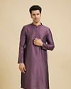 Manyavar Men Royal Purple Jaal Patterned Kurta Set with Embroidered Neckline image number 0