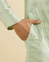 Manyavar Men Soft Green Jaal Patterned Kurta Set with Floral Buta Motifs