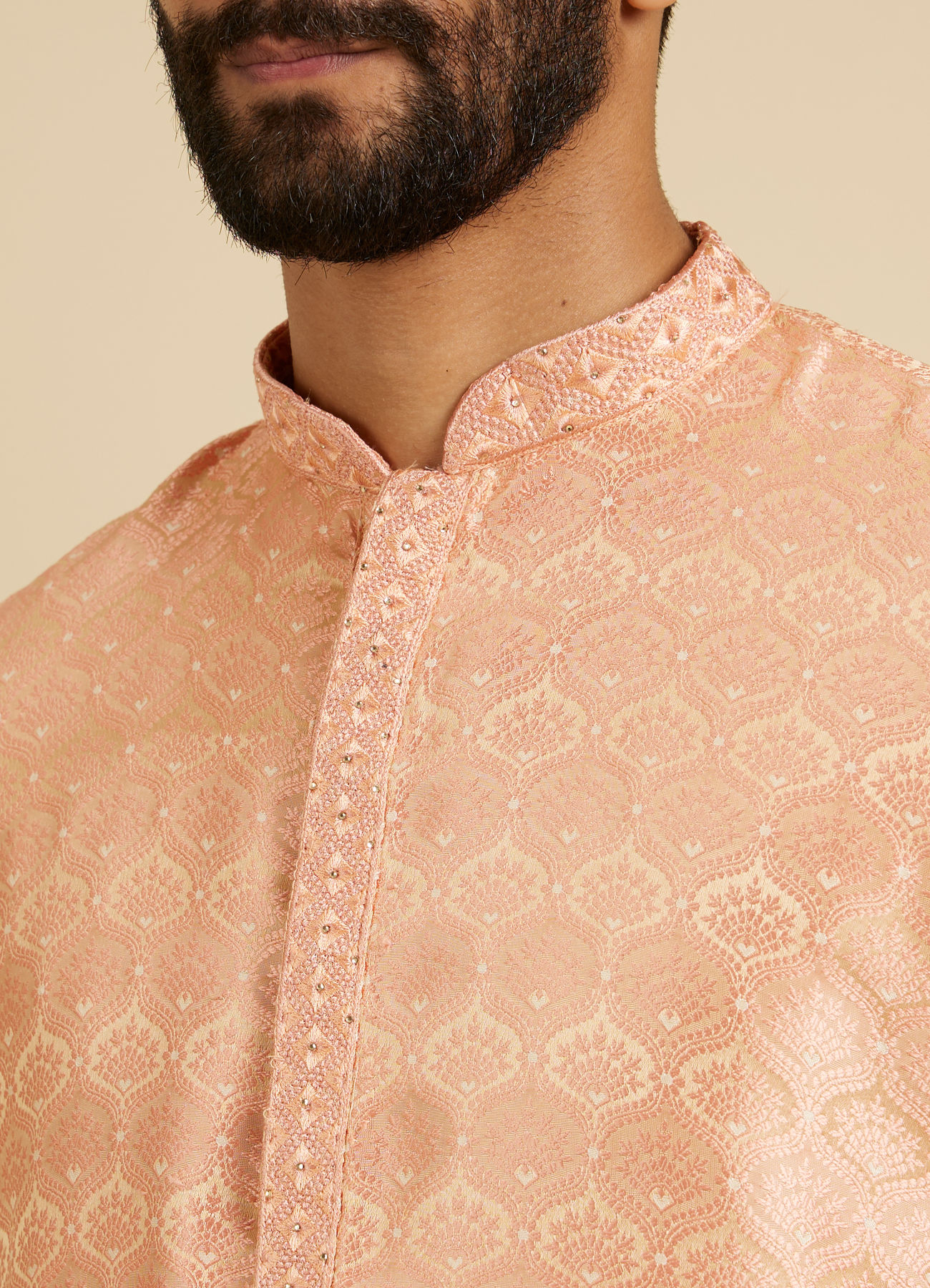 Manyavar Men Peach Fuzz Jaal Patterned Kurta Set with Floral Buta Motifs