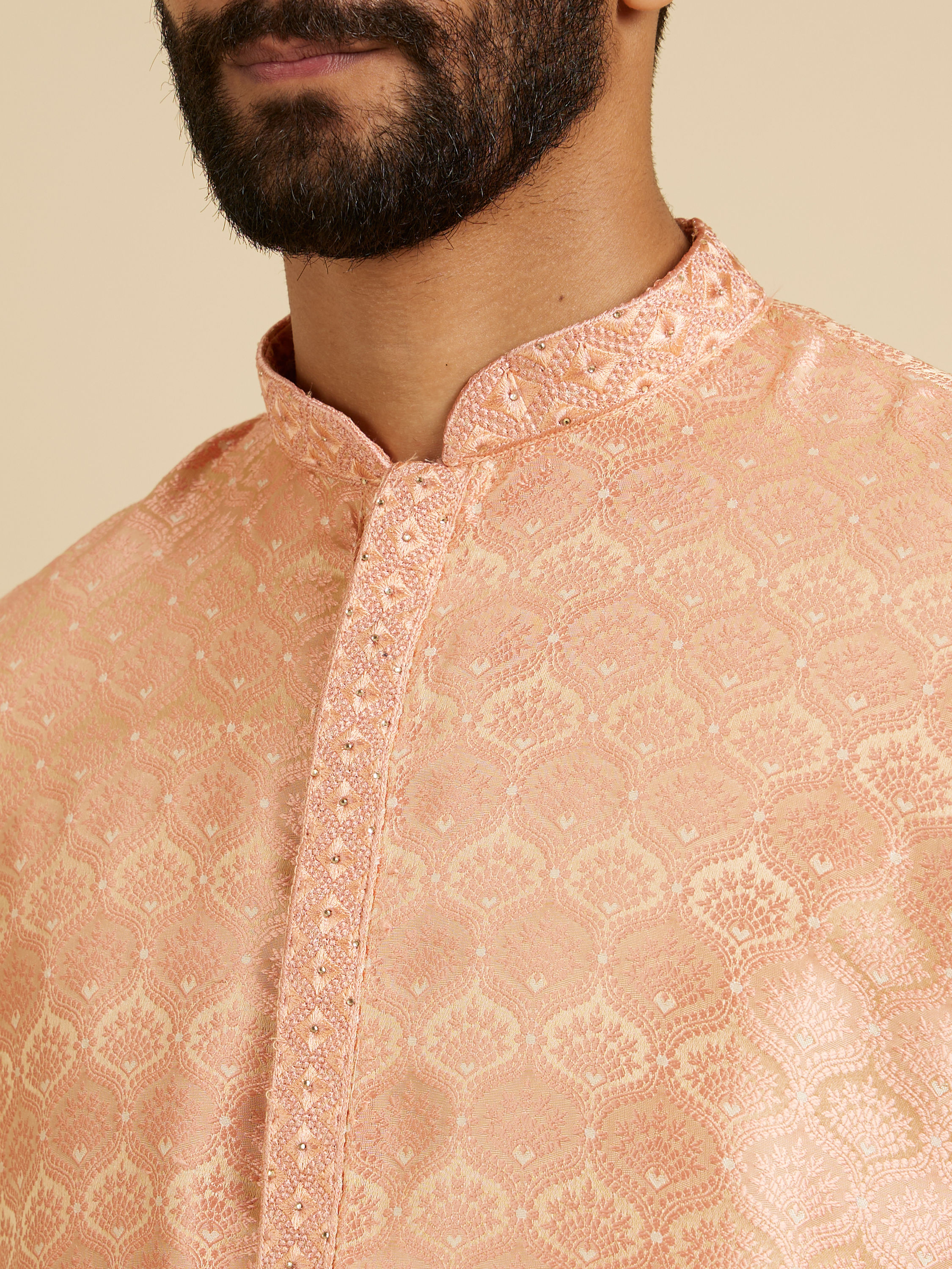 Manyavar Men Peach Fuzz Jaal Patterned Kurta Set with Floral Buta Motifs