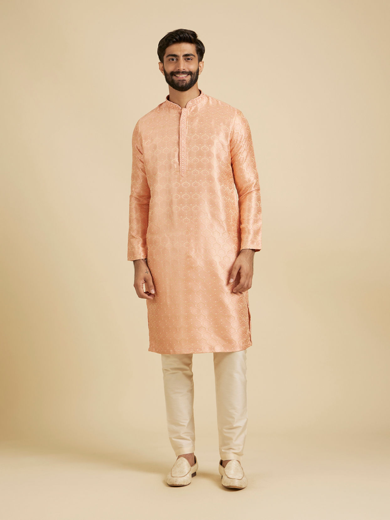 Manyavar Men Peach Fuzz Jaal Patterned Kurta Set with Floral Buta Motifs