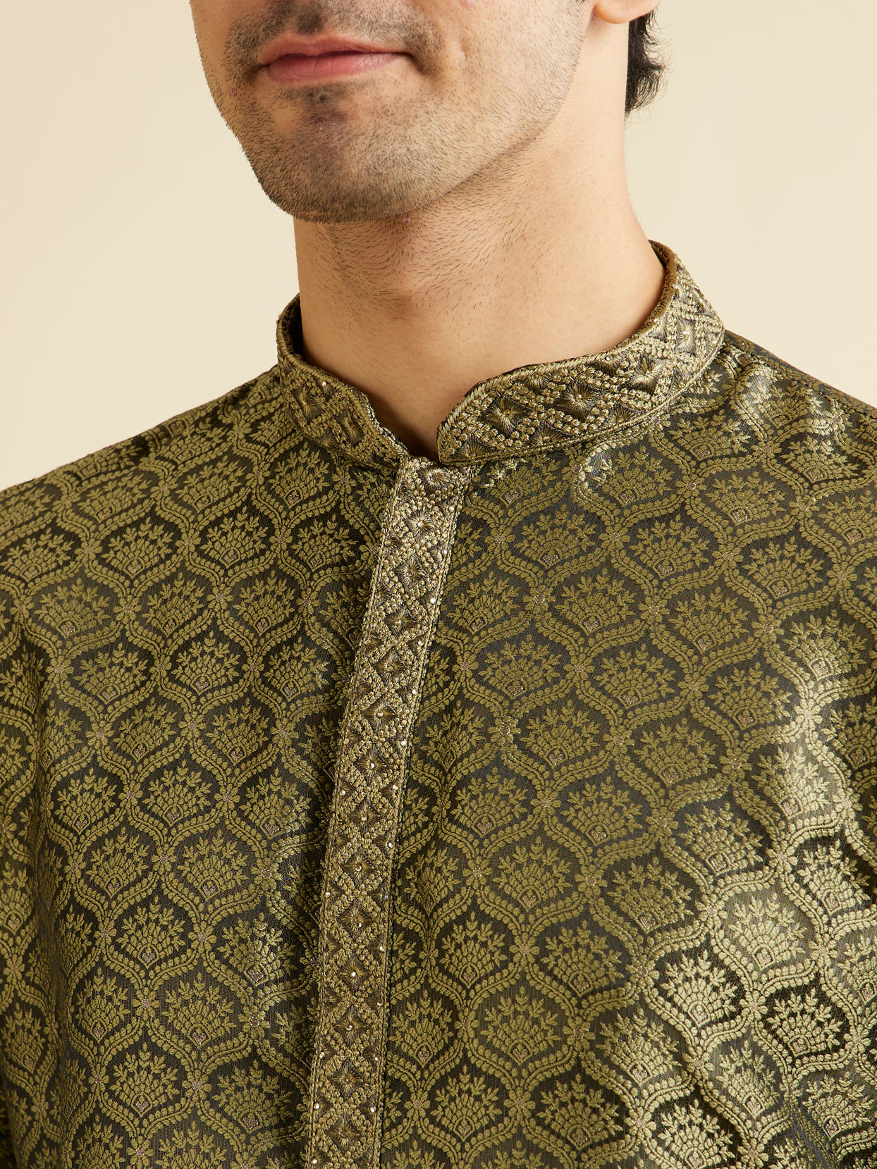 alt message - Manyavar Men Olive Green Jaal Patterned Kurta Set with Floral Buta Motifs image number 1