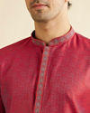 alt message - Manyavar Men Bright Red Self Patterned Kurta Set image number 1