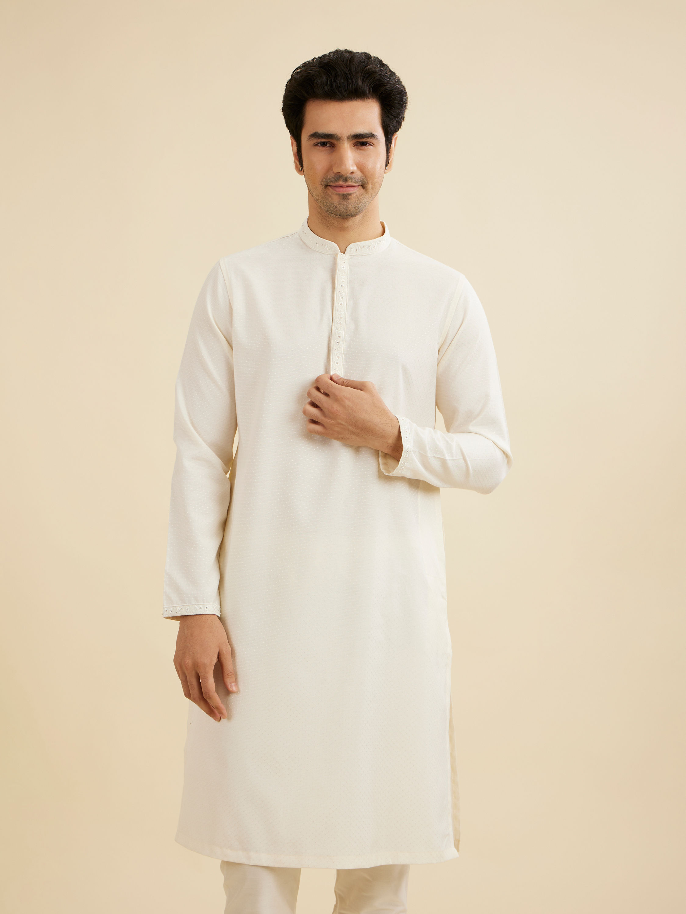 Manyavar Men Warm White Self Textured Kurta Set with Embellished Neckline