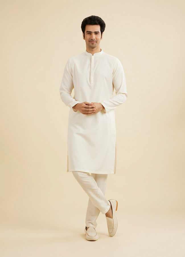 Manyavar Men Warm White Self Textured Kurta Set with Embellished Neckline