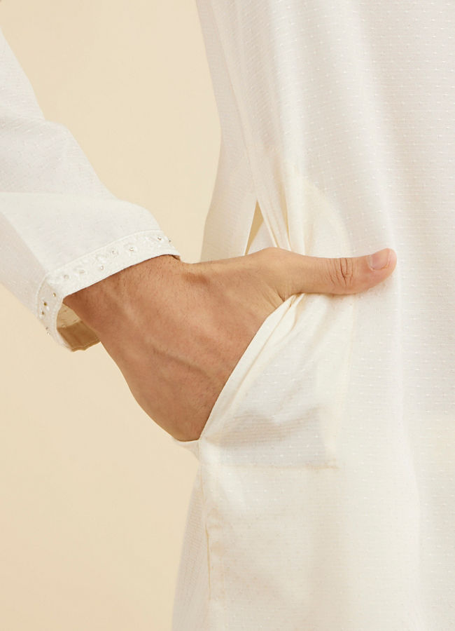 Manyavar Men Warm White Self Textured Kurta Set with Embellished Neckline