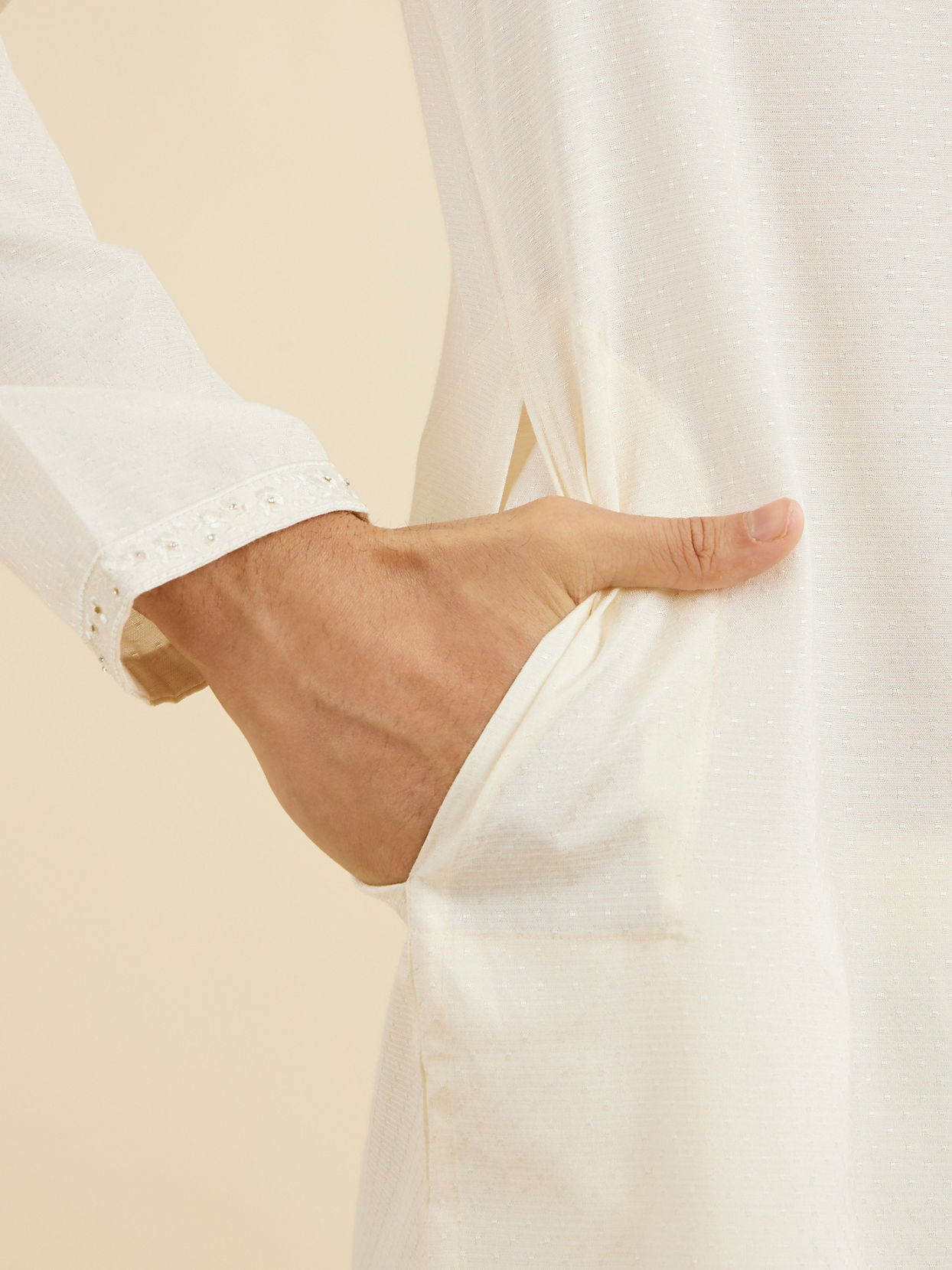 Manyavar Men Warm White Self Textured Kurta Set with Embellished Neckline