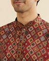 Manyavar Men Maroon Red Kaleidoscopic Grid Printed Kurta Set with Mirror Work