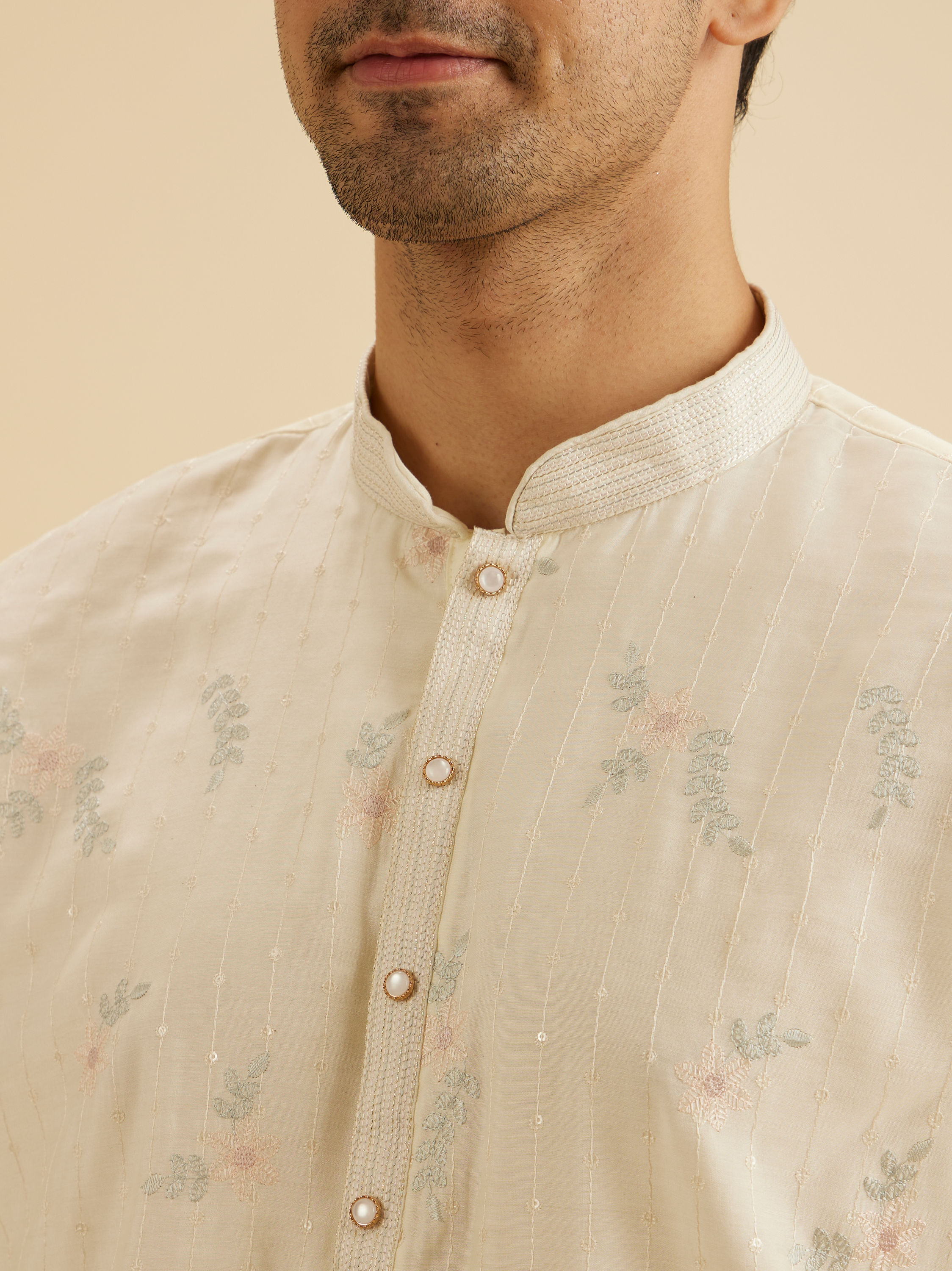 Manyavar Men Graceful Warm White Kurta Pajama