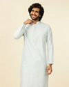 alt message - Manyavar Men Light Blue Kurta Set with Self Motifs image number 0