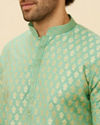 alt message - Manyavar Men Mint Green Floral Buta Motif Patterned Kurta Set image number 1