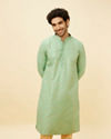 alt message - Manyavar Men Mint Green Floral Buta Motif Patterned Kurta Set image number 0