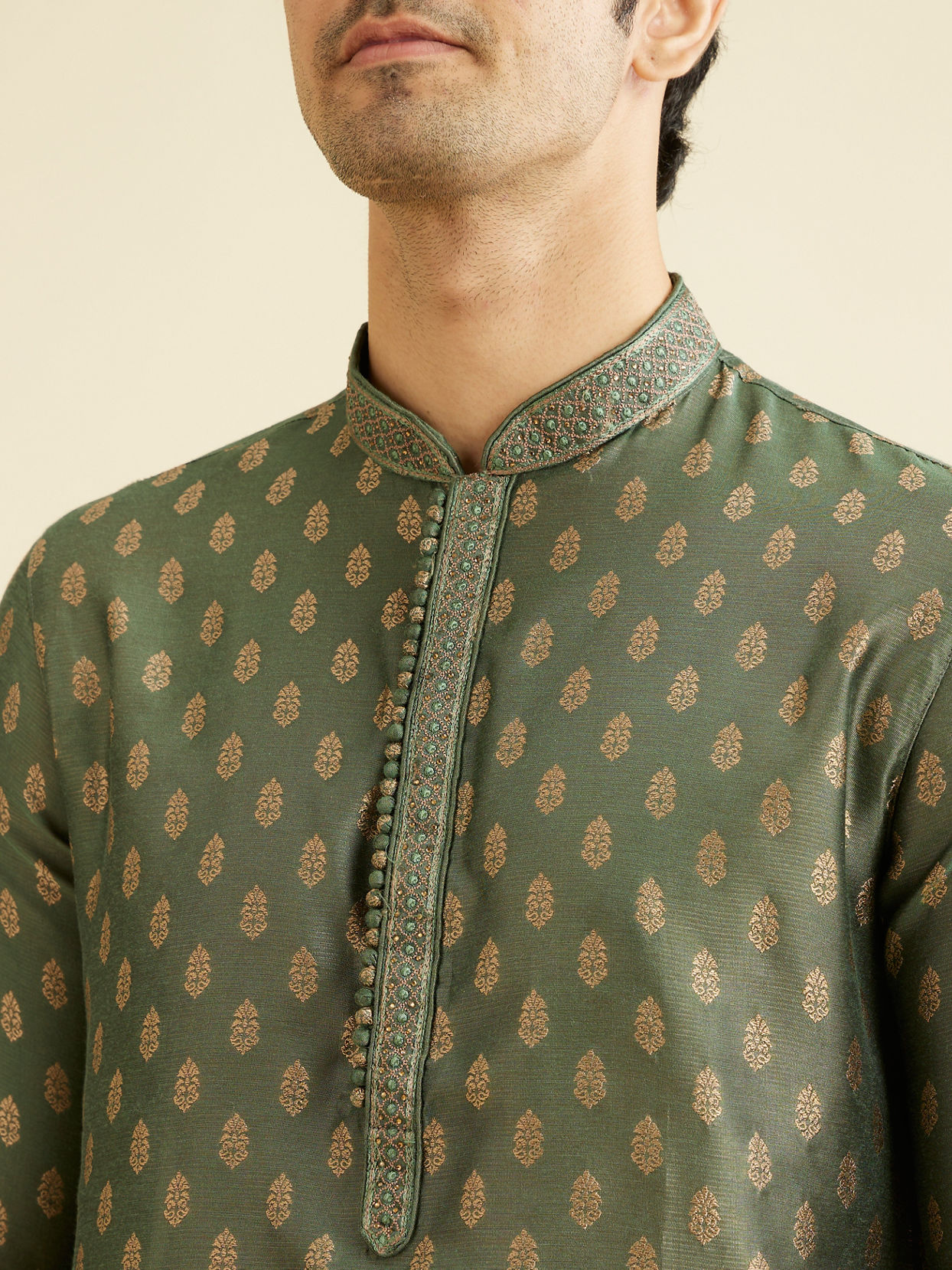 alt message - Manyavar Men Bottle Green Kurta Set With Golden Motifs image number 1