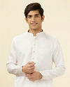 alt message - Manyavar Men Shell White Embellished Button Kurta Set image number 0