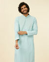 alt message - Manyavar Men Light Blue Grid Patterned Chikankari Kurta Set image number 0