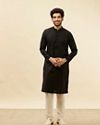 alt message - Manyavar Men Coal Black Embellished Neckline Kurta Set image number 2